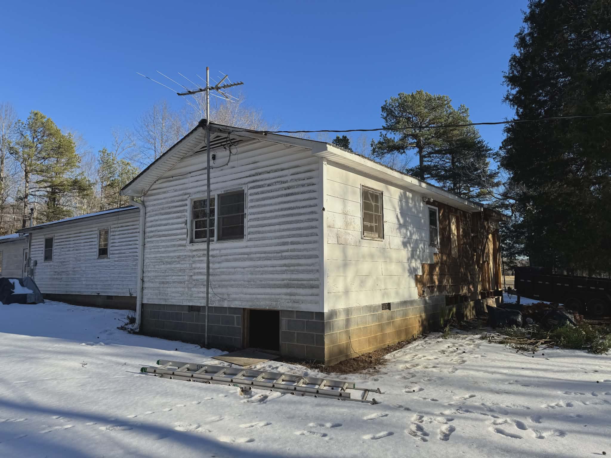 Fresh Start with Home Demolition in a Winter Wonderland image