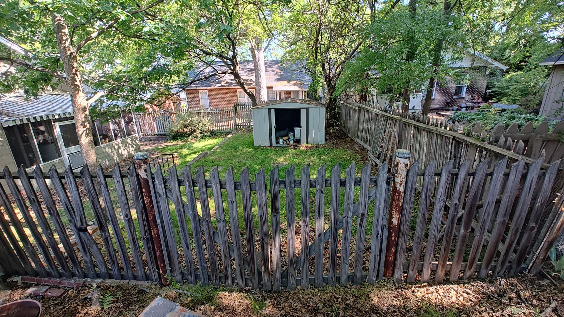Overgrown Side Yard Turned Into a Clean Gravel Parking Spot image
