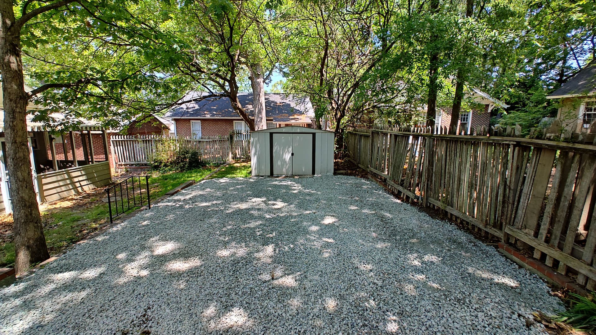Gallery photos for Overgrown Side Yard Turned Into a Clean Gravel Parking Spot: Image #2